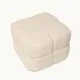 Puff acolchado y tapizado Brayden en color beige