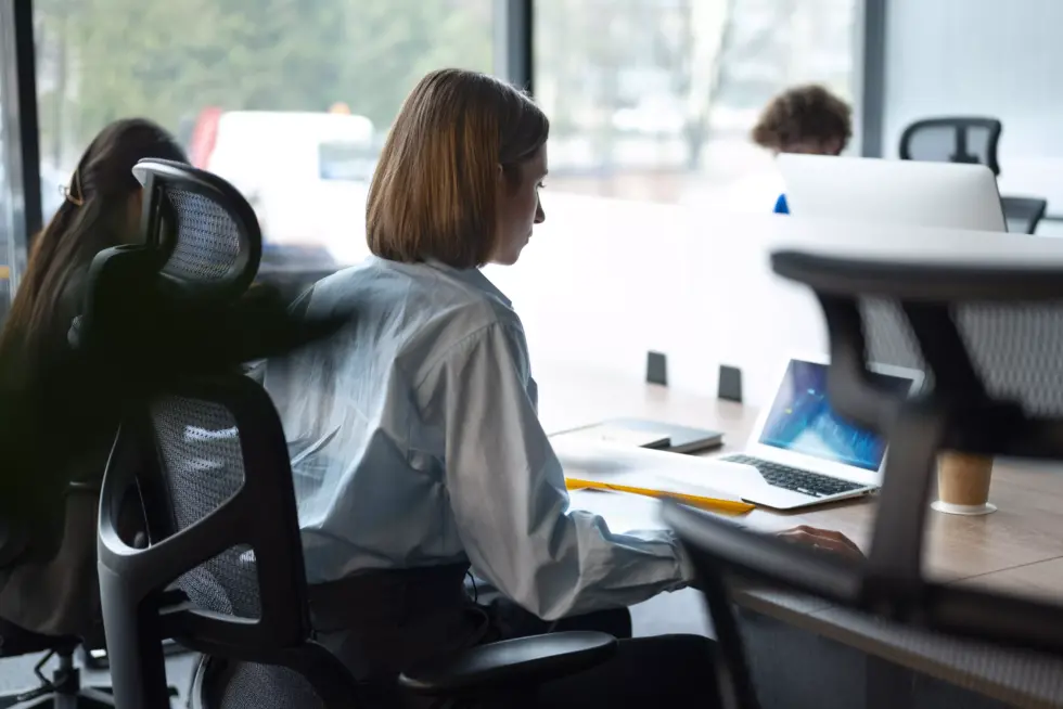 Person office analyzing checking finance graphs